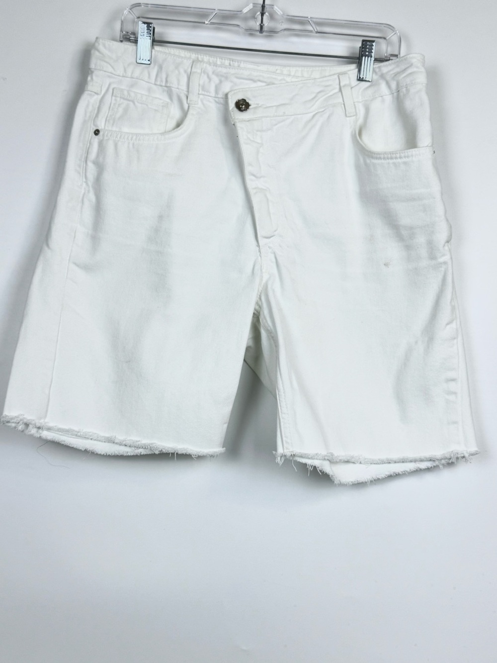 Zara
White Denim Cut-Off Shorts.